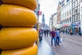 Busy tourist street in Amsterdam and cheese shop Royalty Free Stock Photo