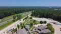 Busy traffic along Highway Interstate 10 in Greenwood, Louisiana near rest area and welcome center, row of semi-trucks, large Royalty Free Stock Photo