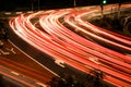 Busy traffic light streaks at night Royalty Free Stock Photo