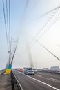 Busy traffic on Moscow bridge in the early morning