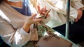 At a busy train station in Japan, a female commuter using her smartphone Royalty Free Stock Photo