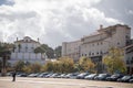 Busy urban area with buildings and parked cars in Alcobaca, Portugal