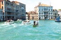 Busy Water Traffic on Venice\'s Grand Canal with Historic Palaces Royalty Free Stock Photo