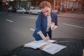 Busy woman is in a hurry, she does not have time, she is going to talk on the phone on the go. Businesswoman doing Royalty Free Stock Photo