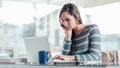 Busy woman working with her laptop Royalty Free Stock Photo