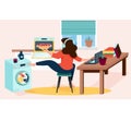 Busy woman working from home  sitting on chair with laptop  cooking and doing household duties Royalty Free Stock Photo