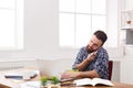 Busy man has business lunch in modern office interior Royalty Free Stock Photo