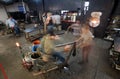 Busy Workers in Glass Workshop