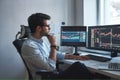 Busy working day. Side view of successful trader or businessman in formal wear and eyeglasses working with charts and Royalty Free Stock Photo