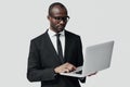 Busy young African man in formalwear Royalty Free Stock Photo