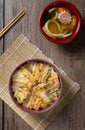 Butadon, Japanese rice bowl dish consisting of bowl of rice topped with pork belly simmered Royalty Free Stock Photo