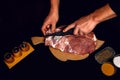 The butcher cuts the pork, marinates the raw meat and cook the kebab Royalty Free Stock Photo