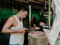 Butcher Cutting Meat at Visakhapatnam,India