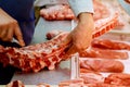 Butcher Preparing Meat In Shop Royalty Free Stock Photo