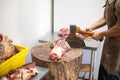 Butcher chopping meat with an axe Royalty Free Stock Photo