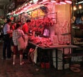 Butcher selling fresh meat Royalty Free Stock Photo