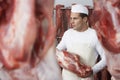 Butcher Working In Meat Locker Royalty Free Stock Photo