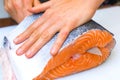 Butchering salmon, piece of salmon red fish meat Royalty Free Stock Photo