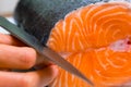 Butchering salmon, piece of salmon red fish meat