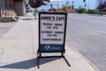 Sign for Annie`s Cafe, a small diner serving all-day breakfast in the downtown area