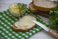 Butter, bread, parsley natural  on a wooden background Royalty Free Stock Photo