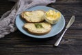 Butter, bread, parsley traditional  gourmet   on a wooden background sliced Royalty Free Stock Photo