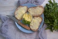 Butter, bread, parsley on a wooden background Royalty Free Stock Photo