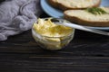 Butter, bread, parsley on a wooden background Royalty Free Stock Photo