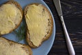 Butter, bread, parsley farmon a wooden background breakfast Royalty Free Stock Photo