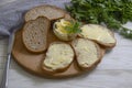 Butter, bread, dairy parsley natural kitchen on a wooden background Royalty Free Stock Photo