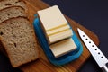 Butter and bread sliced on the board Royalty Free Stock Photo