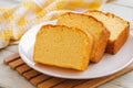 Butter cake sliced on white plate Royalty Free Stock Photo