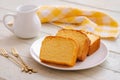 Butter cake sliced on white plate Royalty Free Stock Photo