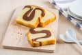 Butter cake sliced on wooden plate Royalty Free Stock Photo
