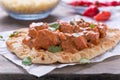 Butter Chicken Curry Served on Naan Royalty Free Stock Photo