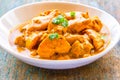 Butter Chicken Served in a Bowl with Cilantro Royalty Free Stock Photo