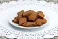Butter chocolate cookies of different shapes on a white napkin Royalty Free Stock Photo