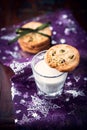 Butter cookie with pistachios on a glass of milk