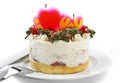 butter cream cake with strawberry & candle on plate Royalty Free Stock Photo