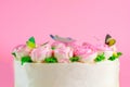 Butter cream of Pink Roses decorated oo vanilla pond cake on pink background with copy space served in Birthday Party and wedding Royalty Free Stock Photo