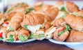 Fresh Croissants, Breakfast sandwiches.Picnic summer food Royalty Free Stock Photo