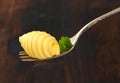 Butter curl on fork Royalty Free Stock Photo