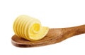 Butter curl on a wooden spoon Royalty Free Stock Photo