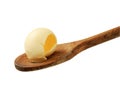 Butter curl on a wooden spoon Royalty Free Stock Photo