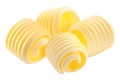 Butter curls rolled up, a group of four,  isolated Royalty Free Stock Photo