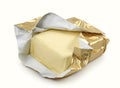 Butter in gold foil Royalty Free Stock Photo