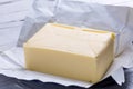 Butter in open packaging Royalty Free Stock Photo