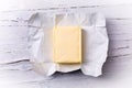 Butter in open packaging Royalty Free Stock Photo
