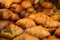 Butter puff croissants on display in artisanal bakery in Paris, France