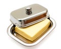 Butter on silver butter dish isolated Royalty Free Stock Photo